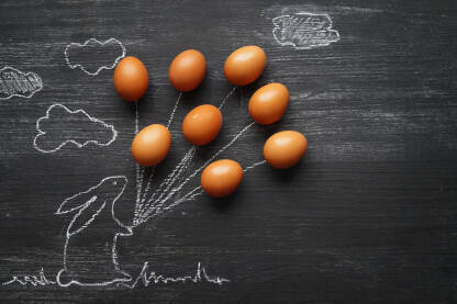 Ilustracija zeca sa balonima od jaja na crnoj podlozi i prostorom za tekst.