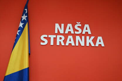 Baner političke stranke "Naša stranka" i zastava BiH. Logo političke stranke. Naša stranka.