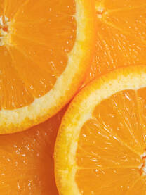 Kriške narandže snimljene izbliza sa prelijepom bojom, sjajem i teksturom, close up photo. Narandža,naranča, orange, zdrava ishrana, voće, citrusi, vitamini.